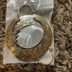 Brand new gold platted earrings